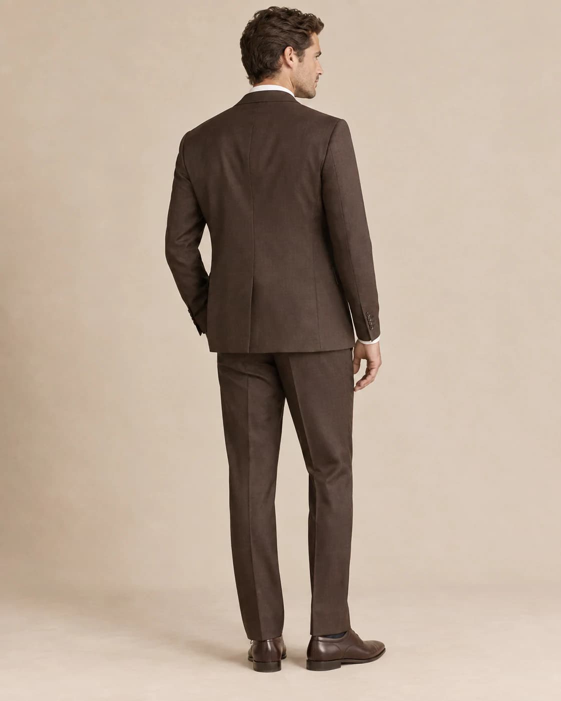Lucien Two-Piece Suit back view showing closure and drape