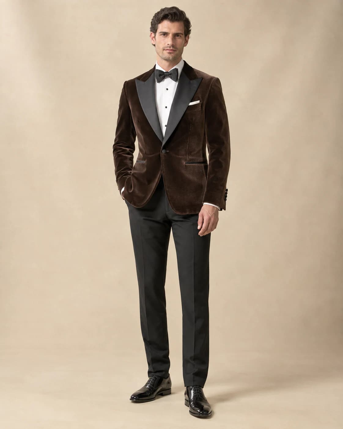 Valentin Velvet Dinner Jacket in chocolate velvet, front view on a plain champagne background